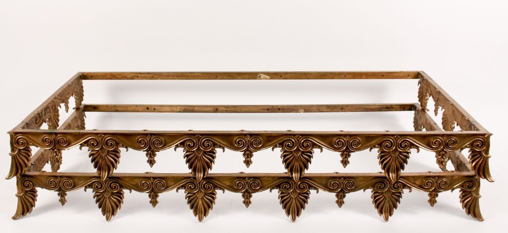 Pair of Gilt Bronze Twin Sized Bed Canopies: 20th century. Pair of matching gilt cast bronze metal twin sized bed canopies or testers with scrolling and leaved frond motif. Unmarked. Each on a rectangular frame with holes in support at back for 