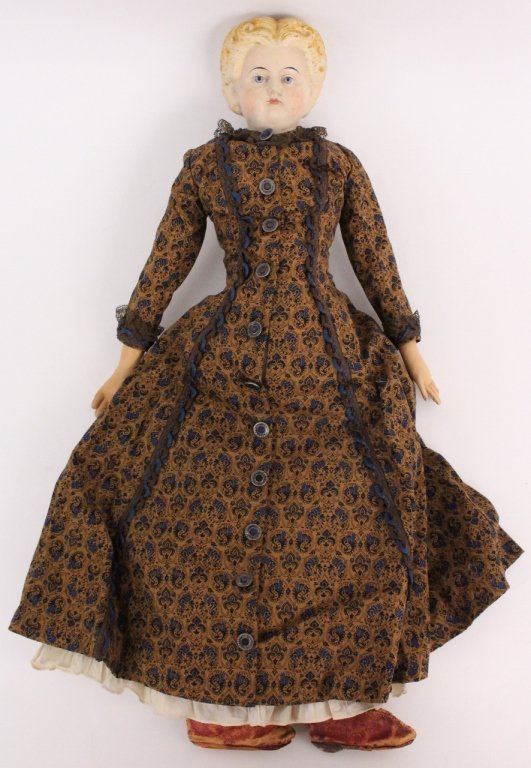 Early Greiner Papier-Mache Doll, Large: American, circa 1858. Papier mache Ludwig Greiner doll marked: Greiner’s Patent Doll Heads, No. 6, Pat. March 30 ‘58, ext. with blonde curled hair, pale blue eyes, and pink lips wearing long navy 