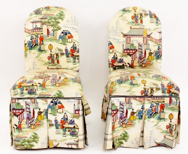 Pair of Chinoiserie Upholstered Slipper Chairs: 20th century. Pair of slipper chairs with rounded back and pleated skirt over fabric covered legs custom upholstered in chinoiserie figural motif fabric with blue and white plaid accent fabric on skir