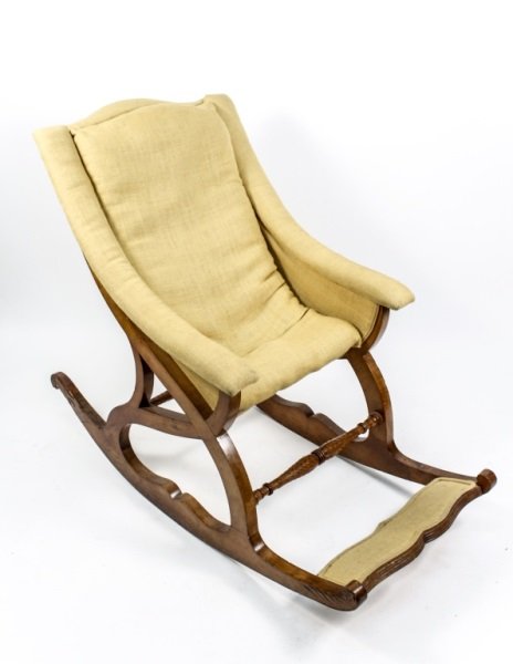 19th C. Burlap Upholstered Carved Rocking Armchair: Continental (likely Austrian), mid 19th century. Hand carved fruitwood framed sleigh form rocker armchair with shabby chic later buttercream yellow burlap fabric upholstery on padded arms, sides, back