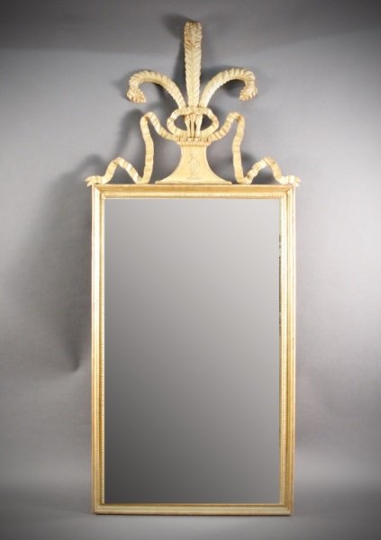 Prince of Wales Plume Gilt Wood Mirror: Late 19th/Early 20th century. Carved wood and gesso gilt wood wall mirror with vertically aligned looking glass with beaded motif lining interior of rectangular frame topped with a Prince of Wales plu