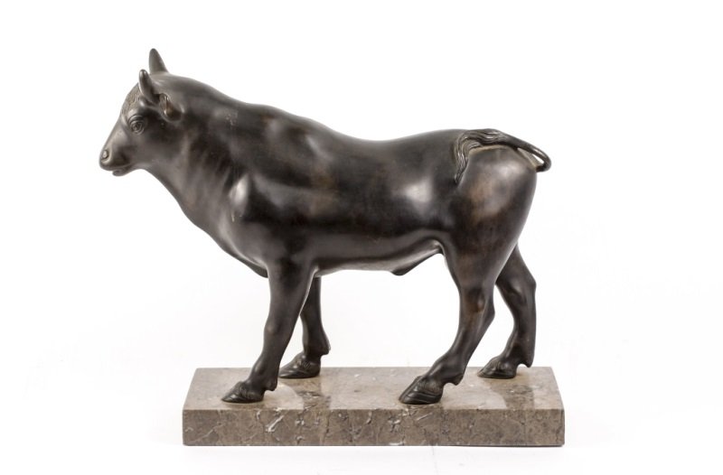 Patinated Bronze Bull Sculpture on Marble Plinth: Continental School, 20th Century. Patinated bronze animals sculpture in the form of a horned bull standing alert with ears pricked forward and mouth open on a rectangular marble plinth. The tail signe