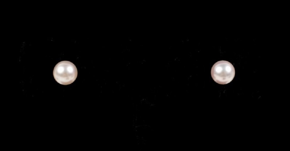 Pair of Mikimoto Cultured White Pearl Earrings: Pair of Mikimoto 18k yellow gold and cultured white pearl stud earrings (approximately 6.5mm).