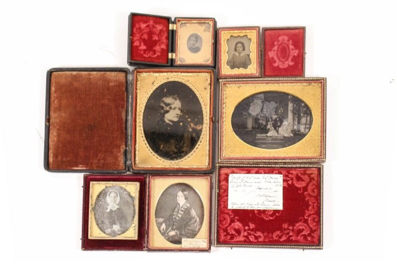 Collection of 6 Daguerrotypes & Ambrotypes: American, 19th century. Group of six daquerrotypes and ambrotypes comprising of a portrait of a young girl contained within in protective case; a portrait of a young boy in hinged protective case; a p