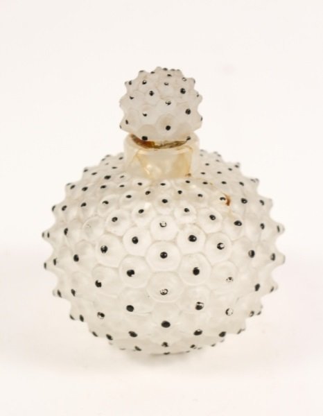Rene Lalique Art Glass Perfume Bottle: French, 20th century. Rene Lalique "Cactus" frosted and molded art glass perfume bottle with bumpy exterior with black hand painted accents. Marked on bottom "R. LALIQUE FRANCE". Approximate height 3.