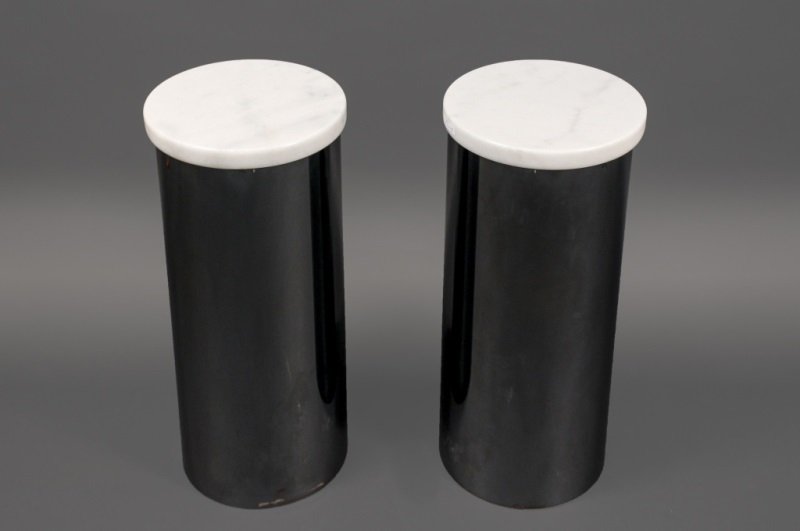 Pair of Metal & Marble Cylindrical Drum Pedestals: American 20th Century. Pair of Mid Century style marble top and metal cylindrical drum form pedestals or side tables, in the manner of Brueton. Apparently unmarked. Height 22.75", diameter of top 10.2