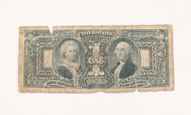 1896 $1 Silver Certificate Educational Bill: American, Late 19th century. United States 1896 one dollar silver certificate educational bill with issue number 260722297 in lower left and upper right. Back of bill with images of Martha and George