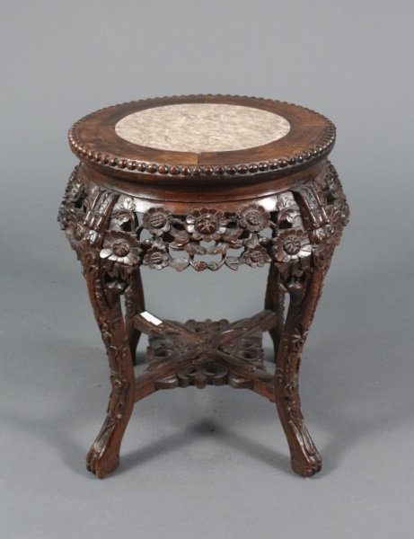 Chinese Carved Hardwood Table w/Inset Marble Top: Chinese export carved hardwood accent or side table with inset circular pink to brown marble top within wooden banding with beaded border above carved and pierced apron with cherry blossom flowers and