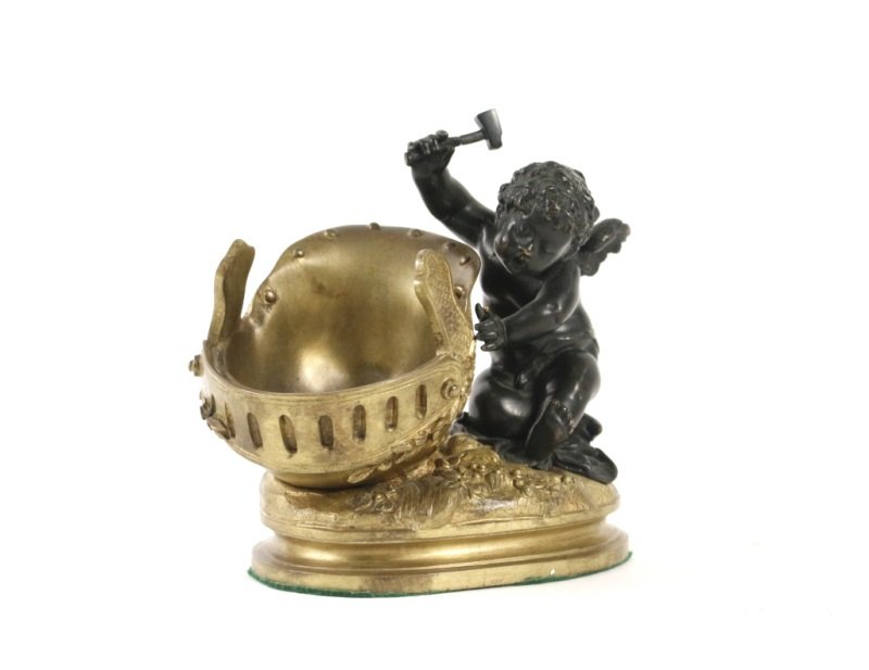 Louis Auguste Moreau Gilt Bronze Cherub Sculpture: Louis Auguste Moreau (French 1834-1917), "Cherub Hammering Helmet", gilt and patinated bronze table top sculpture, incised "Auguste Moreau" on edge. Charming figural sculpture depicting a nude winged