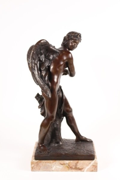 Bronze "Cupid" Sculpture After Louis-Simon Boizot: After Simon-Louis Boizot (French,1743-1809), "Cupid", bronze scupture, incised on base "BOIZOT". Figural sculpture depicting a winged nude male cupid with draped cloth reaching for arrows in quiver an