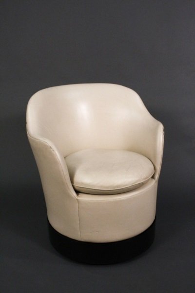 Phillip Enfield White Leather Swivel Armchair: Phillip Enfield (American (New York), 20th century). Circa 1970s, modern and sleek white leather armchair or lounge chair with swivel, tilt and rolling capabilities (similar to others by noted designe