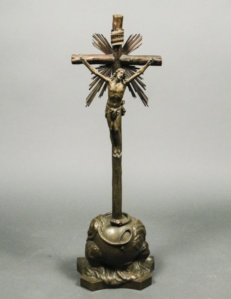 Bronze Statue of Crucifixion on Pink Marble Base: Continental School,19th Century. Bronze sculpture of the Crucifixion with the letters INRI placed on the sign above the cross with radiating beams of light and Jesus Christ figure with draped cloth mo