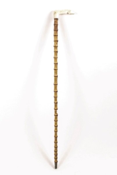 Bamboo Cane w/Carved Ivory Horse Leg & Hoof Handle: Late 19th/Early 20th century. Antique bamboo cane or walking stick with handle formed of carved ivory in the shape of a horse leg with horseshoe on hoof. Apparently unsigned. Approximate length 27.25"