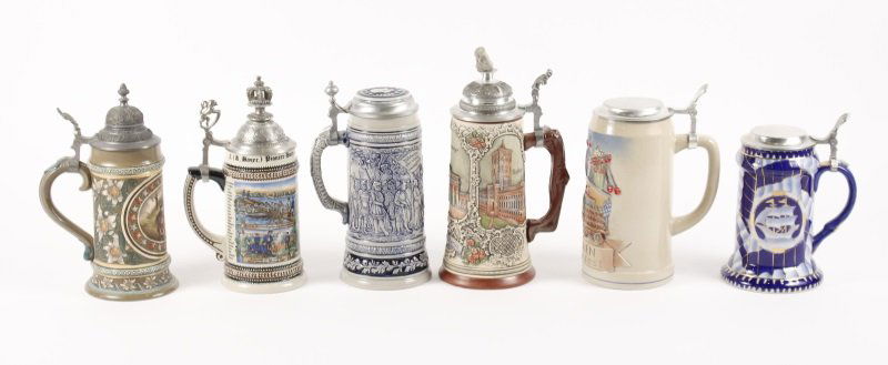 Collection of 6 German Beer Tankards or Steins: Germany, 20th century. A collection of six German tankards or bier steins, each having a metal hinged lid, comprising of a Simon Peter Gerz stoneware tankard with hand painted decoration in earth tone