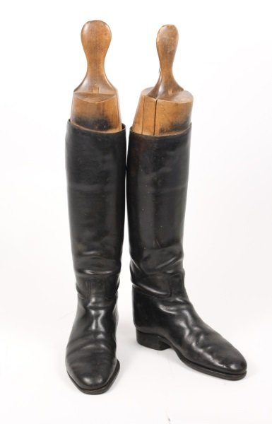 Pair of English Leather Riding Boots: English, Early 20th century (circa 1900). Pair of black leather riding boots with wooden trees. Interior of tall boots with impressed "TOM HILL (KNIGHTSBRIDGE) LIMITED 26, BROMPTON ROAD, LONDON S.W.1.