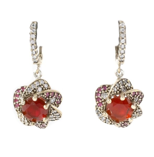 Ladies Sterling & Opal Earrings: Pair of ladies sterling silver and gold plated earrings with 10mm Mexican opal at center accented by cubic zirconiums and rubies. Marked 925. Each measures approximately 1.5" x 0.75". Total weight app