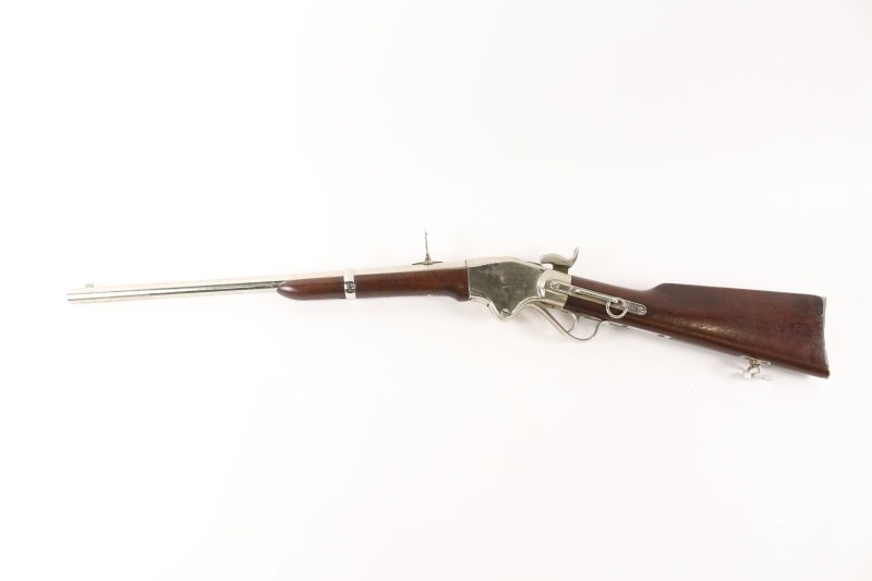 Spencer Model 1860 Carbine, Civil War Era: Model 1860 Spencer Civil War era (1863-1865) repeating carbine with stained wood stock. Serial number 46117 on top. Length approximately 39.25". Provenance: From the Private Collection of Gaylyn Shelv