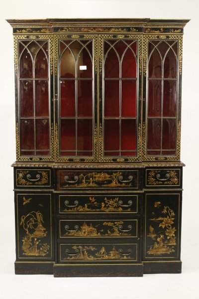 Regency Style Chinoiserie Decorated Secretary: American, 20th century. Regency style black lacquered chinoiserie decorated secretary with breakfront molded projecting crest above a frieze decorated with figures and landscape over 4 molded glazed d
