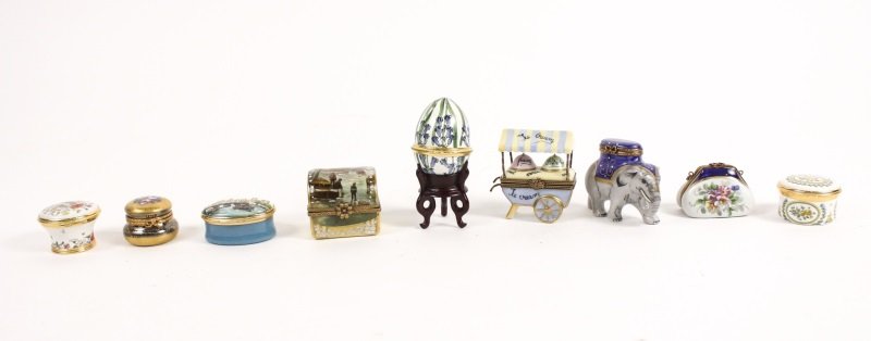 Collection of 9 Limoges & Halcyon Days Pill Boxes: English and French, 20th century. A collection of pill boxes comprising of 4 made by Halcyon Days Enamels, one round decorate with a Happy Birthday motif, one pedestal form with floral motif, one oval
