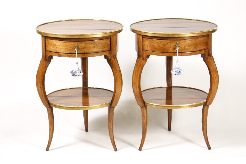 Pair of Dessin Fournir Walnut Side Tables: Matched pair of Dessin Fournir walnut and parcel gilt decorated side tables, both with circular top within a parcel gilt border over a single conforming frieze drawer raised on cabriole legs united by