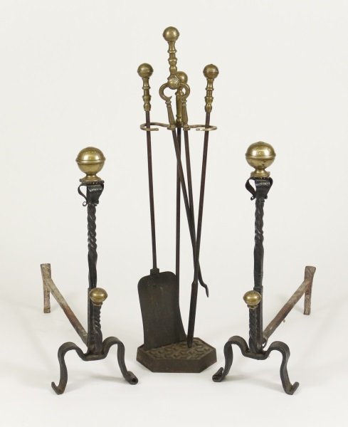 3 Piece Wrought Iron & Brass Andirons & Firetools: 19th century. Three piece fire set comprising of a pair of andirons or fire dogs with rounded brass ball finial at top above wrought iron frame with leaf tips at top, twisted shaft and arched incised 