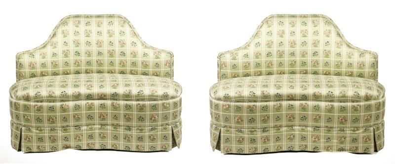 Pair of Brunschwig & Fils Upholstered Loveseats: Matched pair of 20th century Brunschwig & Fils loveseats, each with arched padded back over a kidney shaped seat with skirt and single rectangular throw pillow. Both in matching green upholstery decor