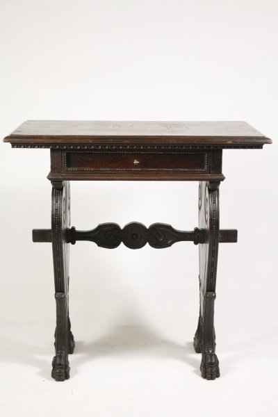 Italian Baroque Style Lectern or Library Table: Italian, late19th century. Italian Baroque style walnut lectern or library table with rectangular top over an egg and dart carved cornice and single frieze paneled drawer decorated with bead-and-reel 