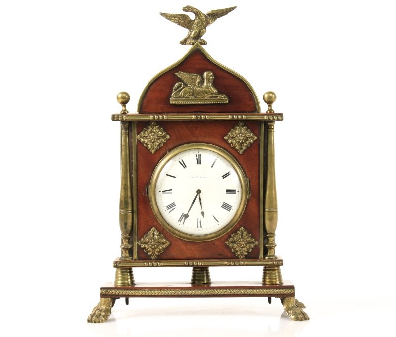 Mahogany Wood Sedan Clock, John White, London: English, Late19th/Early 20th century. Mahogany wood sedan clock with glazed round hinged cover protecting white enamel dial with black Roman numerals marked "WILL'M TRIGGS.", possibly for retailer. Br