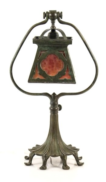 Tiffany Studios Harp Form Desk Lamp, #470: American, circa 1899 - 1918. Tiffany Studios Harp Form Desk Lamp, the articulated harp form standard raised on spreading eight petal floriform base with lily pad feet with verdigris patination and mar