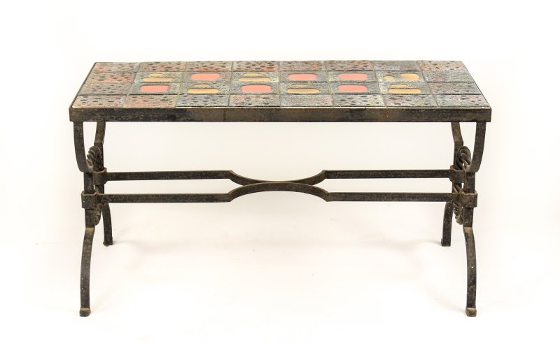 Jacques Adnet For Poillerat Iron Coffee Table: French, circa 1940s. Small tile top and iron cocktail or coffee table for Gilbert Poillerat designed by Jacques Adnet, the colorful tile top inset into a patinated rectangular iron frame, supported to