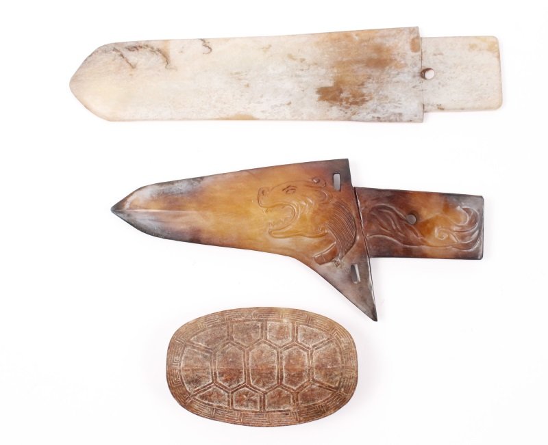 Group of 3 Chinese Carved Stone Items: A collection of Chinese carved stone items comprising of a carved brown stone turtle shell, possibly of jade, with bas relief shell details to ovular top and apertured protrusion to back with an archa