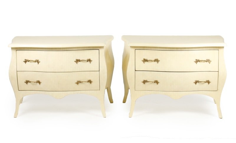 Pair of Jimeco Bone Veneered Bombe Low Commodes: Jimeco (Colombian, founded 1976). A late 20th century matched pair of French style bone veneered serpentine bombe two drawer low commodes, the tiled veneer of tessellated pattern, each chest with shap
