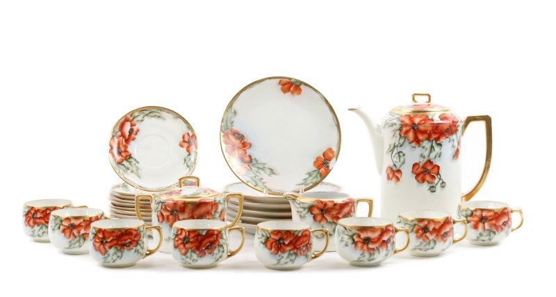 Porcelain Dessert Set, Poppy Motif (27 Pcs): Austrian and Bavarian, first half of 20th century. Well-matched twenty-seven piece porcelain dessert set from various makers including J & C, Thomas, and Moritz Zdekauer comprising of a tall lidded co