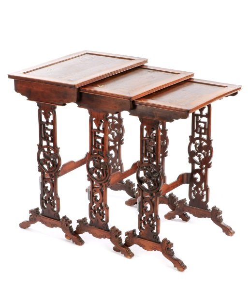 Set of 3 French Marquetry Inlaid Nesting Tables: Likely French, late 19th/ early 20th century. A set of three mahogany nesting tables of Asian inspired chinoiserie design, each with mother of pearl, silver gilt and bone marquetry inlaid tops, scallo