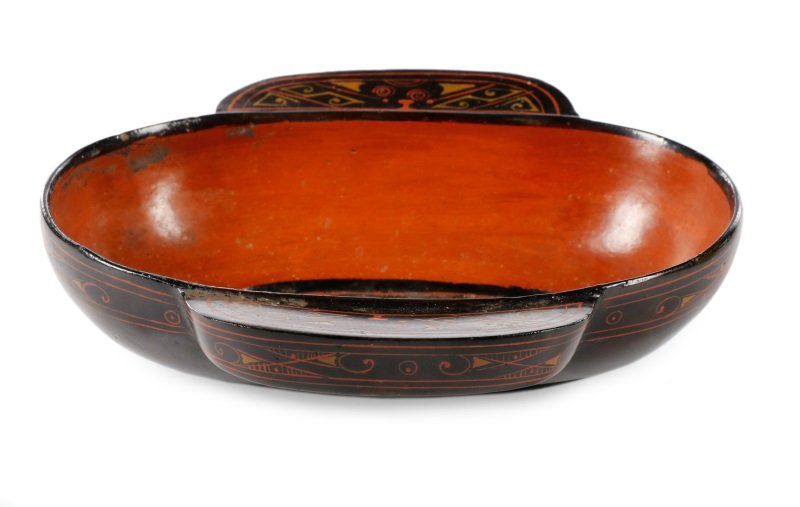 Chinese Ming Dynasty Style Lacquered Bowl: Chinese, likely 20th century. Ming Dynasty (1368–1644) style lacquered oblong bowl with recessed oblong medallion at center of with gilt and red scrolled motif on black lacquered ground, encircled b