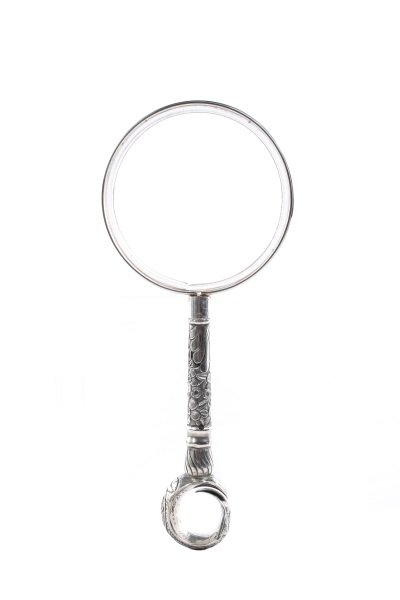 Sterling Silver and Optical Magnifying Glass: Parasol handle, likely later converted into magnifying glass. stamped for Donegan Optical Company (American, founded 1952) and mounted onto a floral sterling-silver shaft embossed with an intricate le