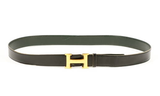 Classic Men's Hermes Constance Leather Belt: Hermes (French, founded 1837- ). Classic men's calfskin leather "Constance" belt with iconic gold tone H buckle, stamped with "HERMES" on an unmarked reversible calfskin leather belt with black exteri