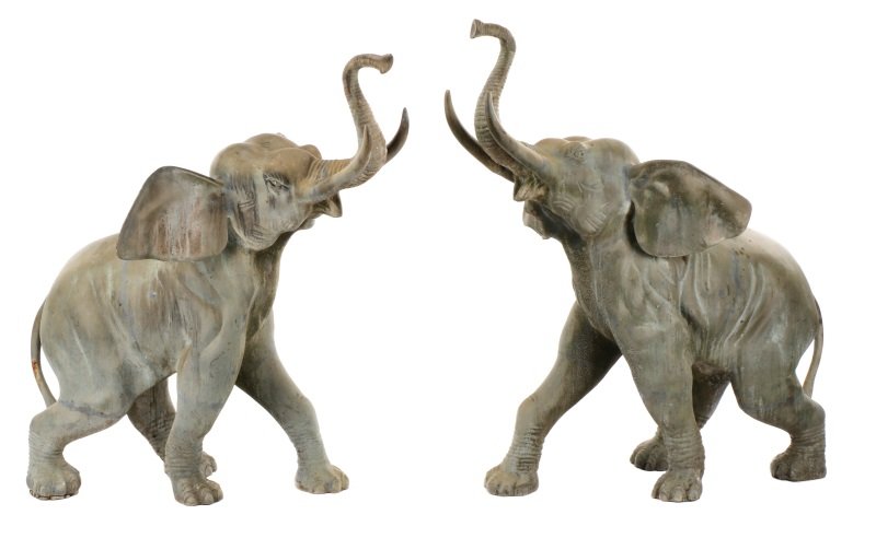 Pair of Life Size Bronze Baby Elephant Sculptures: Pair of life size zinc colored bronze baby elephant sculptures, both with trunks and tusks up, having mouths open and ears wide, one with left leg forward, the other with right leg forward. Neither ap