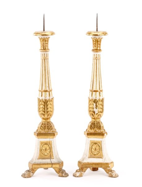 Italian Patinated & Parcel Gilt Candle Prickets: Italian, 19th century. Pair of patinated and parcel gilt carved wood tall candle prickets or altar prickets with leaf tip accents at top below sharp metal pricket on a tapered fluted shaft with additi