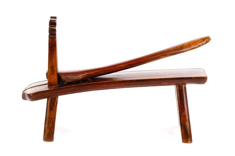 Chinese Wine or Herb Press, Late 19th Century: Chinese, Late 19th century. Carved wood food press, likely for fruit or herbs with long spoon form lever with brass metal accent with raised dots forming pattern above circular disk on angled bench, l