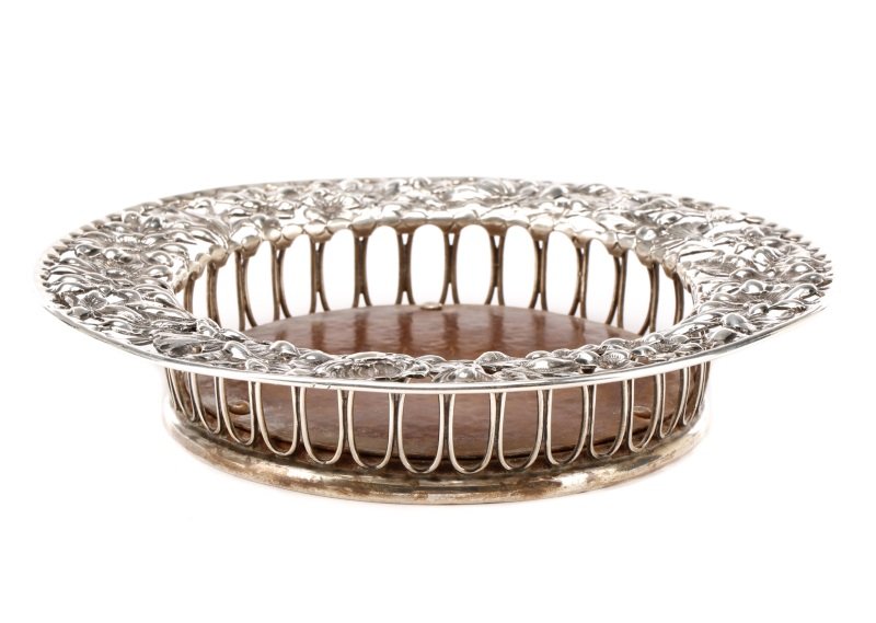 1886 Gorham Sterling & Copper Wine Coaster: Gorham (American (Rhode Island), founded 1831), circa 1886. A sterling silver and copper wine bottle coaster of round form with secured hammered copper liner surmounted by a short wall formed by a ban