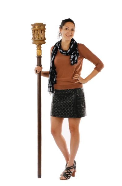 Italian Gothic Carved & Gilt Wood Torchere: Italian, 14th century. Gothic hand carved and gilt wood figural torchere with with recessed niche at top for candle, cylindrical body with floral rosettes at top border above six relief carved male ro