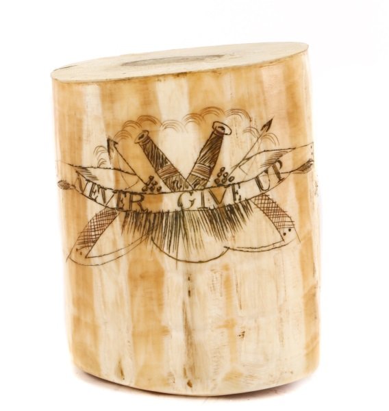 "Never Give Up" Engraved Scrimshaw Tooth, 19th C.: American, 19th century. Scrimshaw whale tooth with flattened bottom and open top leading to hollowed interior, exterior with inverted engraving - one side with text "NEVER GIVE UP" on ribbon surroundi