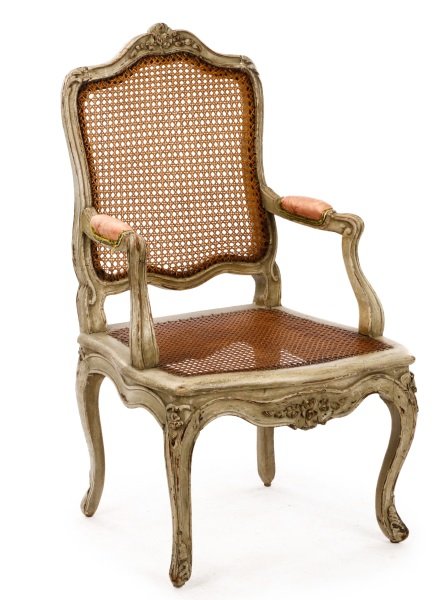 Louis XV Period Painted & Caned Fauteuil: French, probably third quarter 18th century. Louis XV paint decorated fauteuil having an arched back carved with scrolled acanthus and a central floral garland over a caned back, padded armrests and c