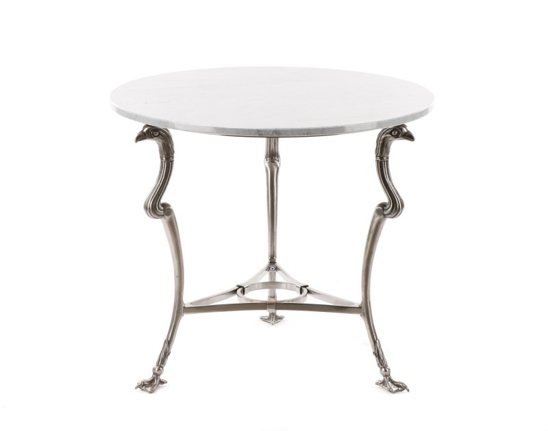 Italian Nickel Gueridon or Occasional Table: Italian, 20th century. A nickel gueridon or occasional table having a circular gray marble top supported by three legs modeled as eagle or hawk monopodia united by a triangular shaped stretcher and te