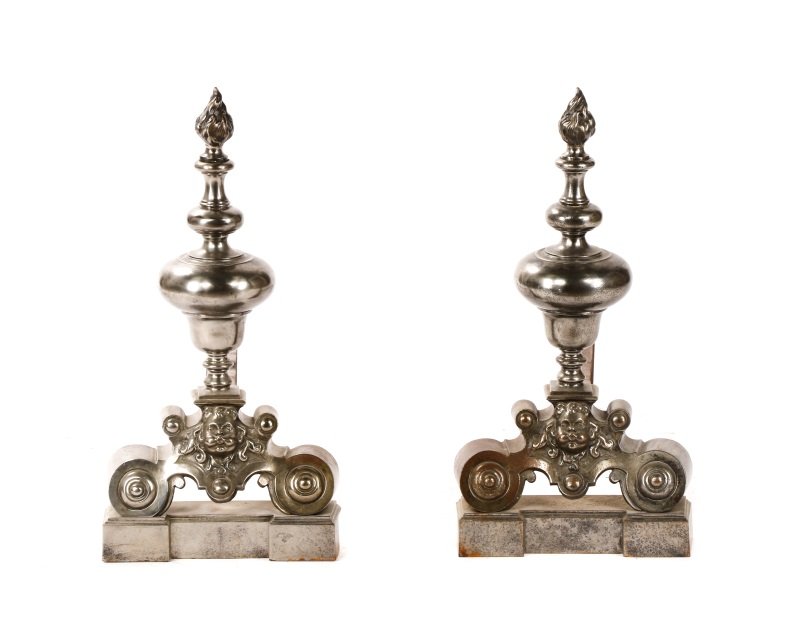 Fine Figural French Andirons With Flambeau Finial: French, late 19th / early 20th century. A mated pair of heavy figural steel andirons or firedogs, each having a large flambeau finial surmounted to turned shaft with bulbous body, with figural base de