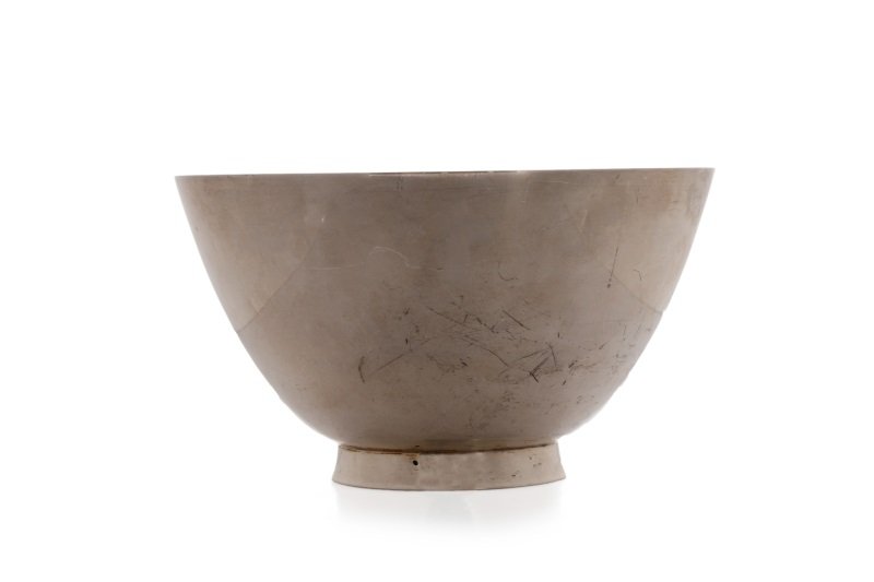 Tiffany & Co. Sterling Silver Footed Bowl c. 1950: Tiffany & Co. (American (New York), founded 1837), circa 1947-1956. A simple but heavy sterling silver bowl of round form raised on a subtly flaring ring foot. Engraved to underside "Ladies / Amateur 