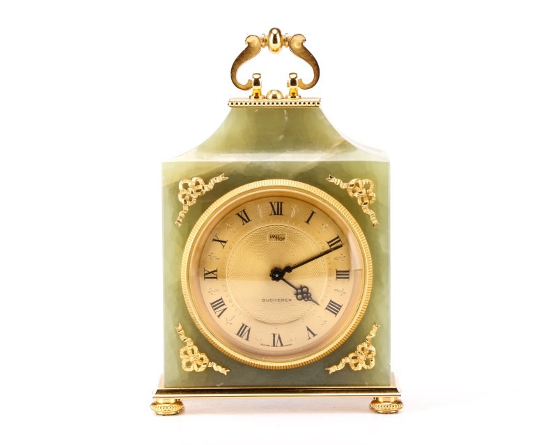 Imhof Swiss Empire Style Clock, Retailed Bucherer: Arthur Imhof (Switzerland, 1924-2001), circa 1960s. A fine green onyx and gilt brass Empire style 8 day swiss mantel clock retailed by Bucherer, No. 1744743, Ref. 82-803. The movement cal. 244, nickel