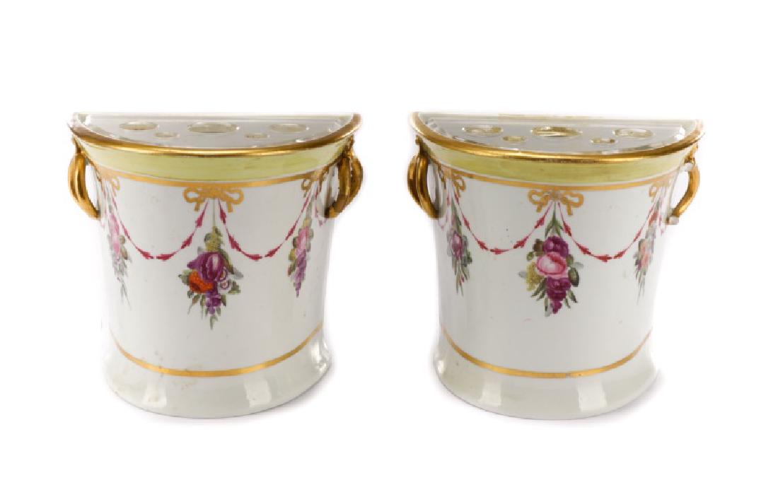 Pair of Early Davenport Demilune Bough Pots: Davenport (English, 1793-1887), circa 1793-1810. A matched pair of fine porcelain bough pots or jardiniere vases in demilune form with white ground and gilt detailing, the body with three hand painted
