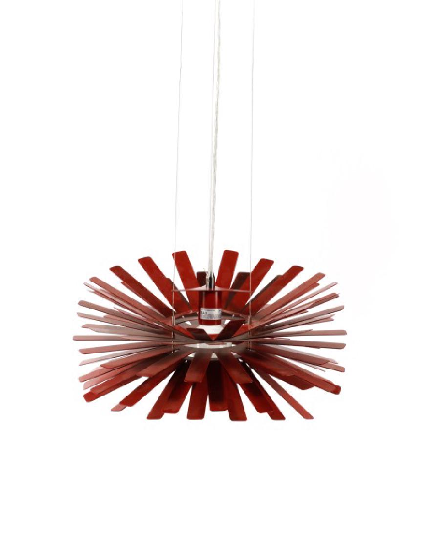 George Kovacs Hanging Red Pendant Light: George Kovacs Lighting (American, founded mid 20th century). A contemporary hanging pendant lamp in matte red, having a circular flower or star fixture and a single socket. With manufacturer's label a